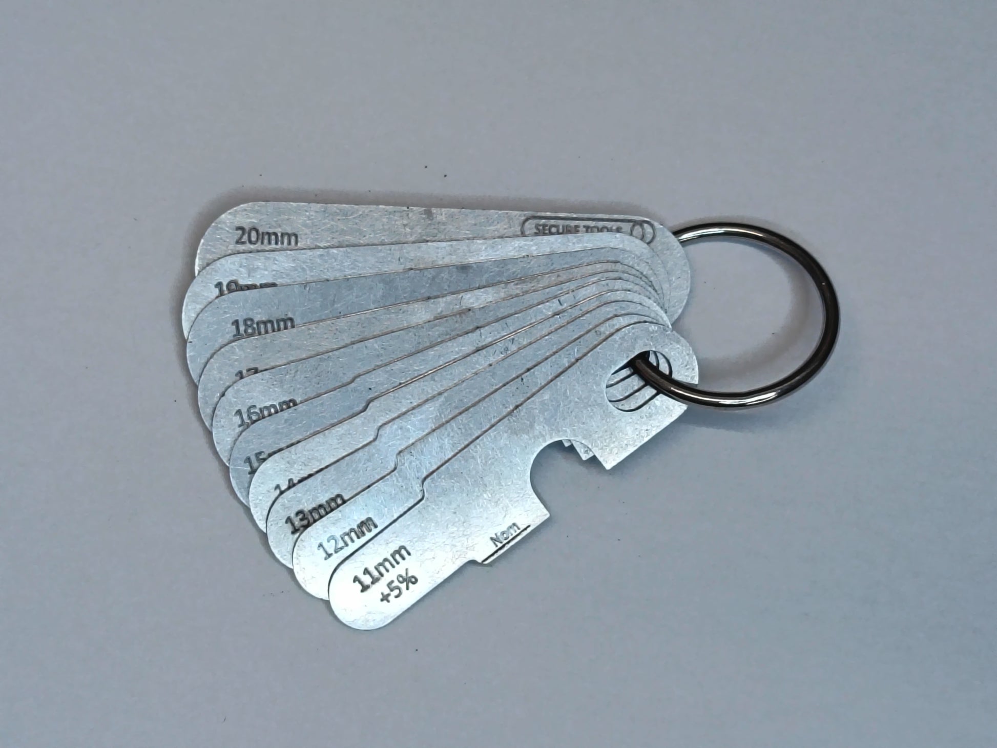 wire rope and sheave gauge  on a grey background