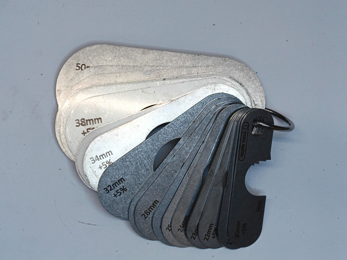 wire rope and sheave gauge  on a grey background