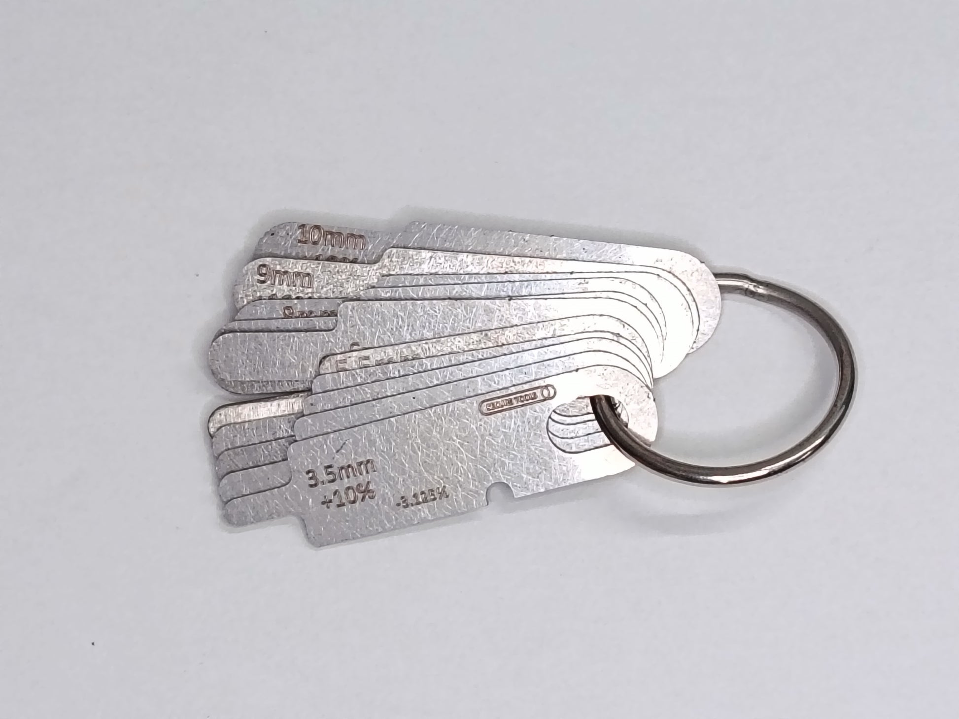 wire rope and sheave gauge  on a grey background