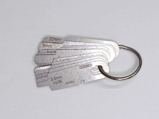 wire rope and sheave gauge  on a grey background
