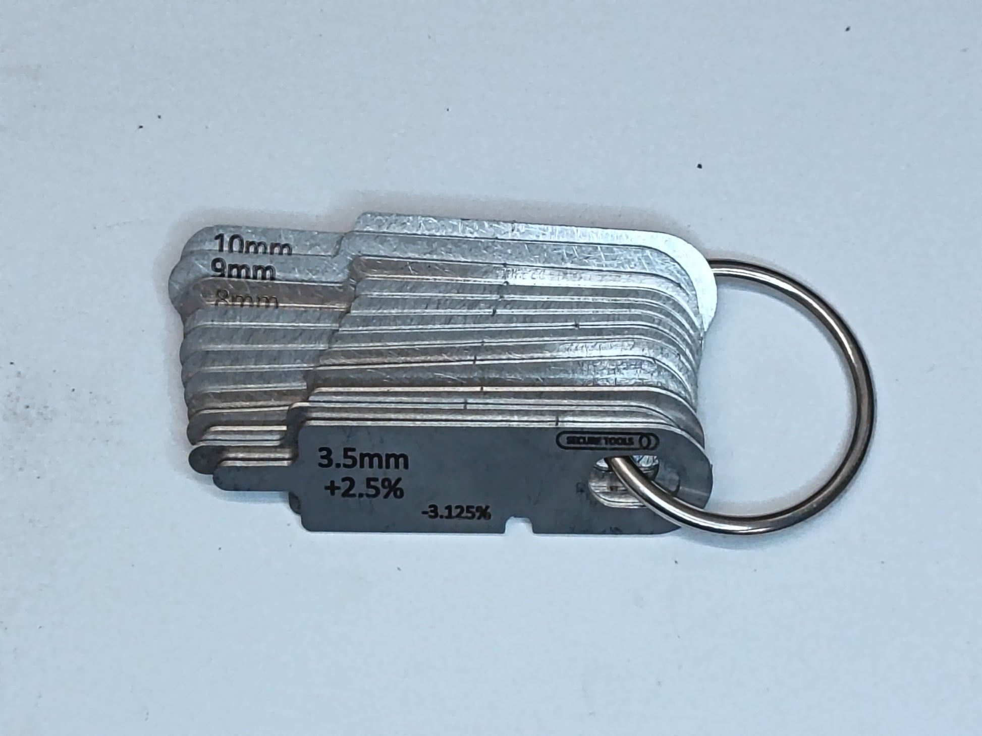 wire rope and sheave gauge  on a grey background