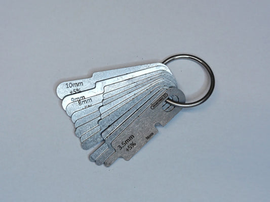 wire rope and sheave gauge  on a grey background