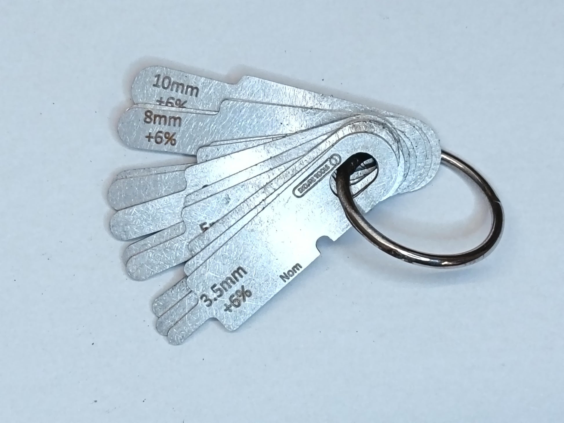 wire rope and sheave gauge  on a grey background