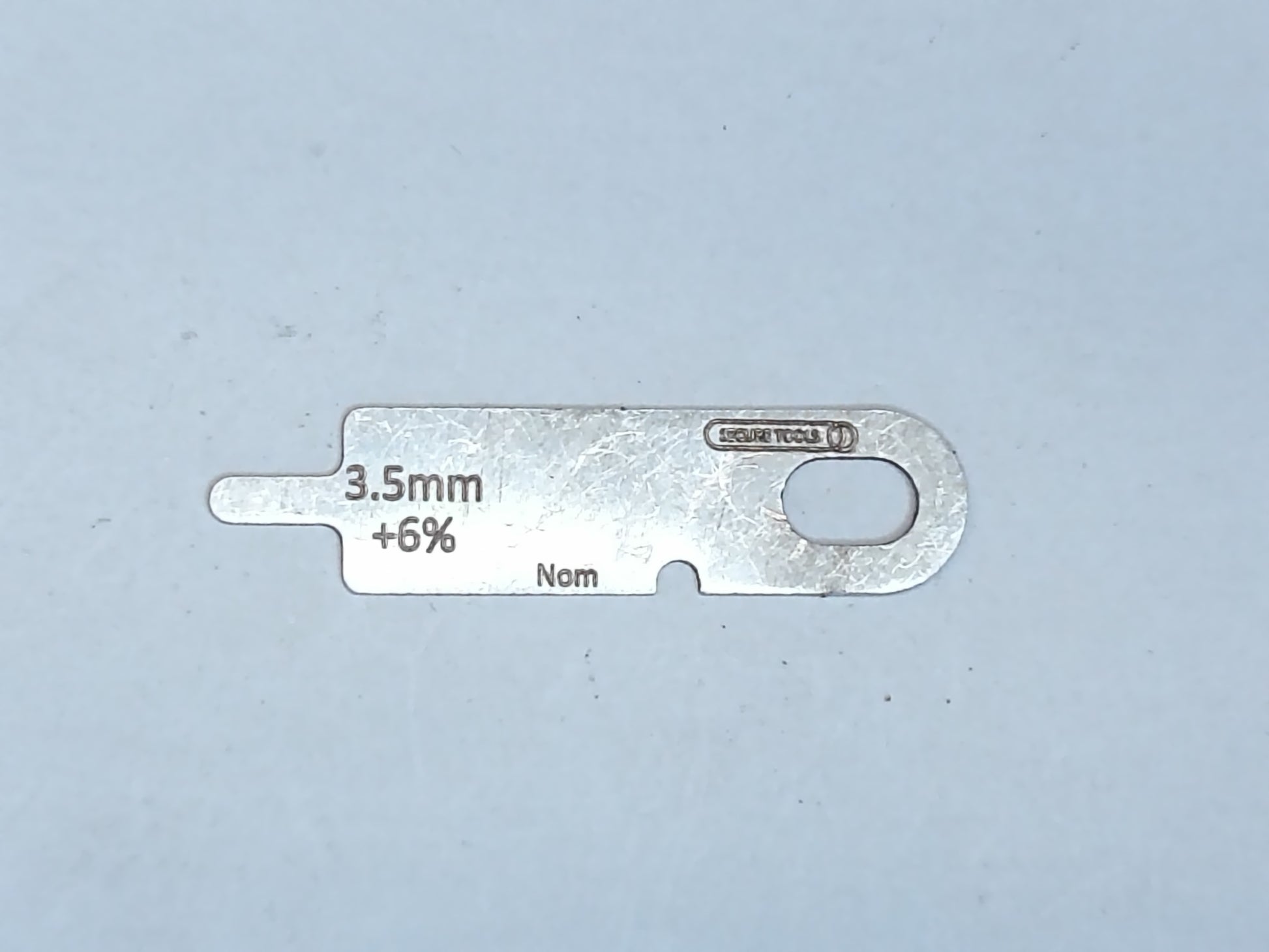 wire rope and sheave gauge  on a grey background