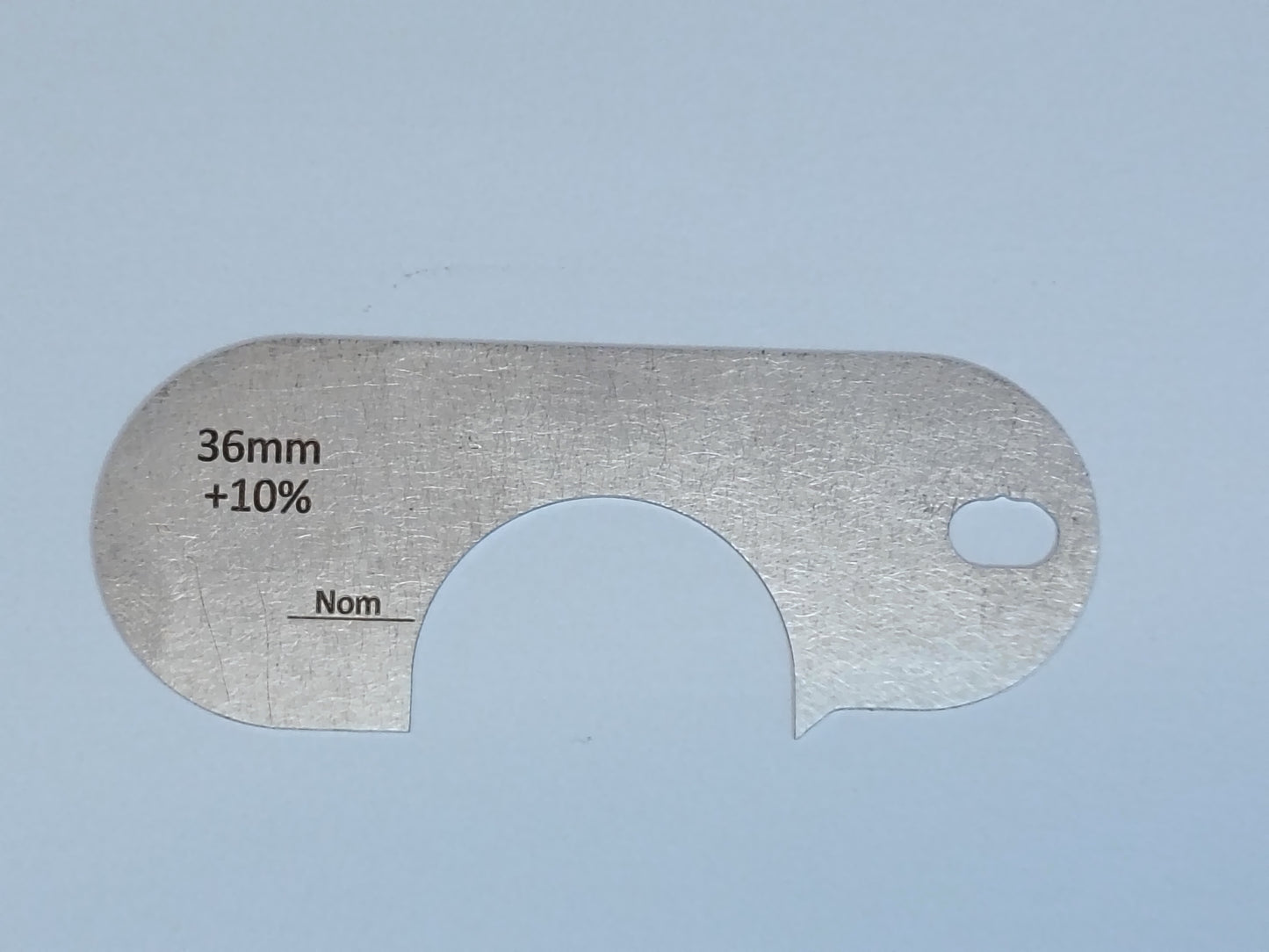 wire rope and sheave gauge  on a grey background