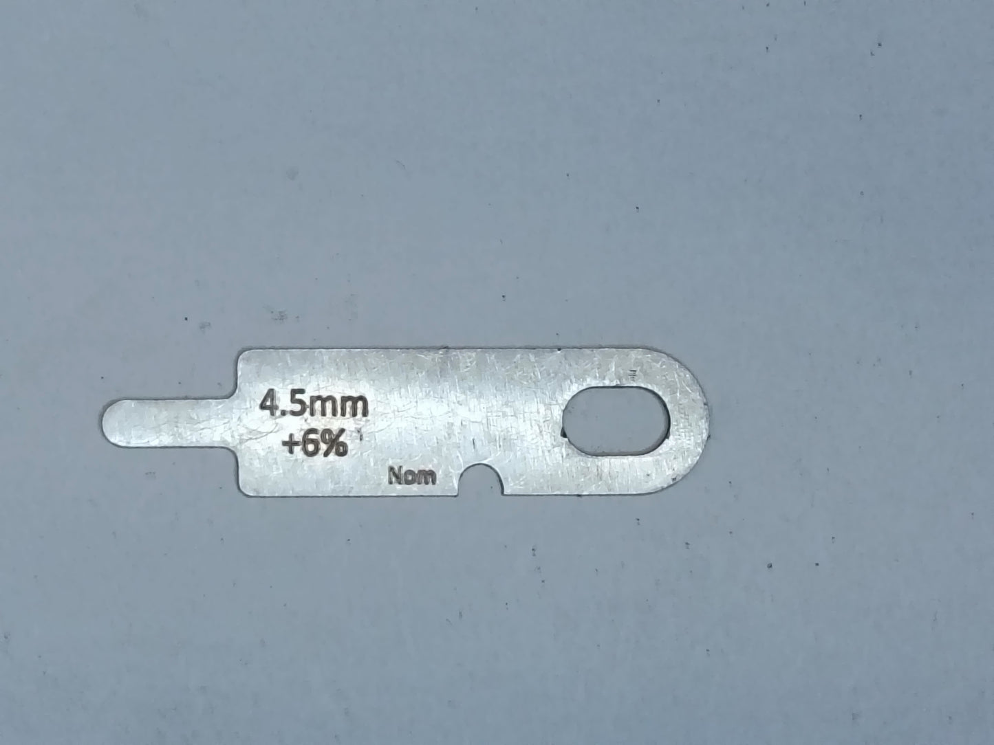 wire rope and sheave gauge  on a grey background