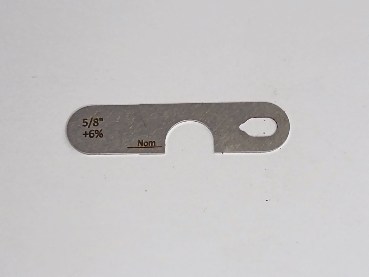wire rope and sheave gauge  on a grey background