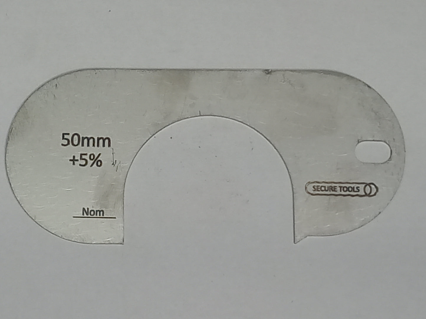 wire rope and sheave gauge  on a grey background