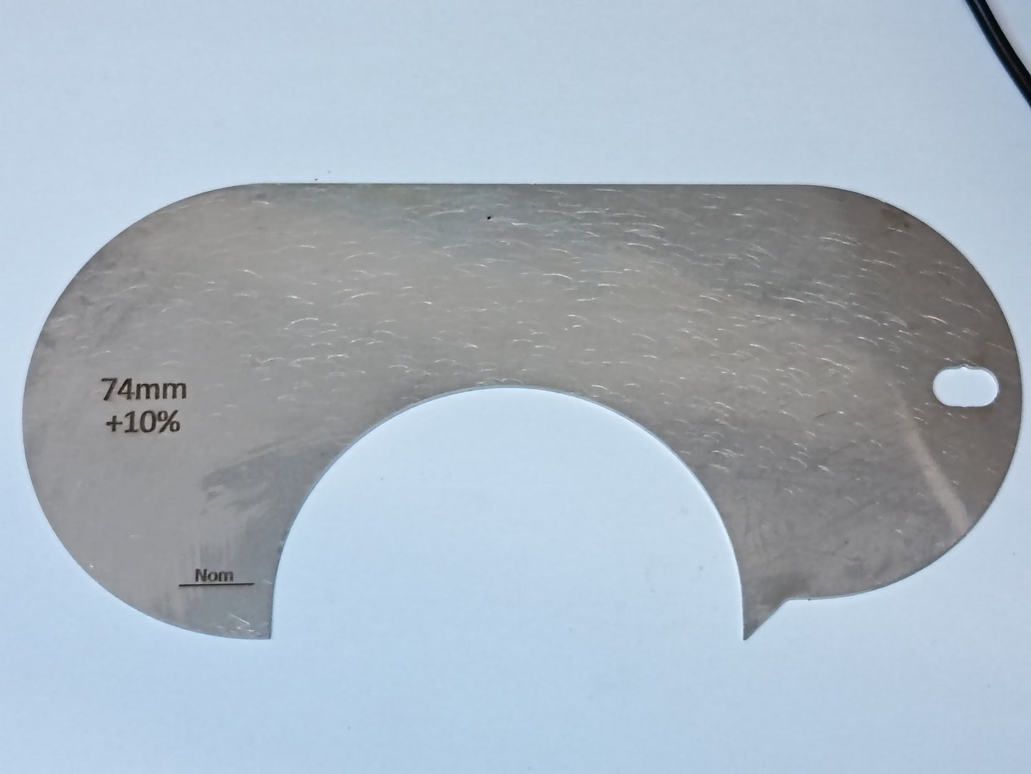 wire rope and sheave gauge  on a grey background