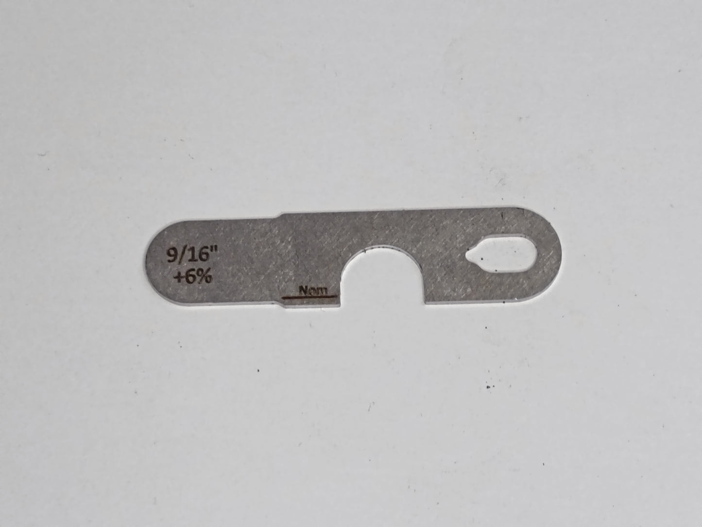 wire rope and sheave gauge  on a grey background